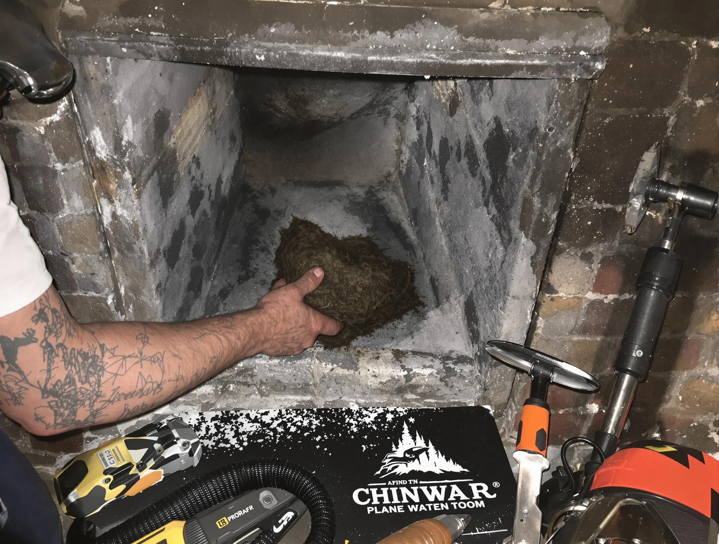 Sheridan Chimney Sweep safely removing debris and screening chimney in Sheridan, CO